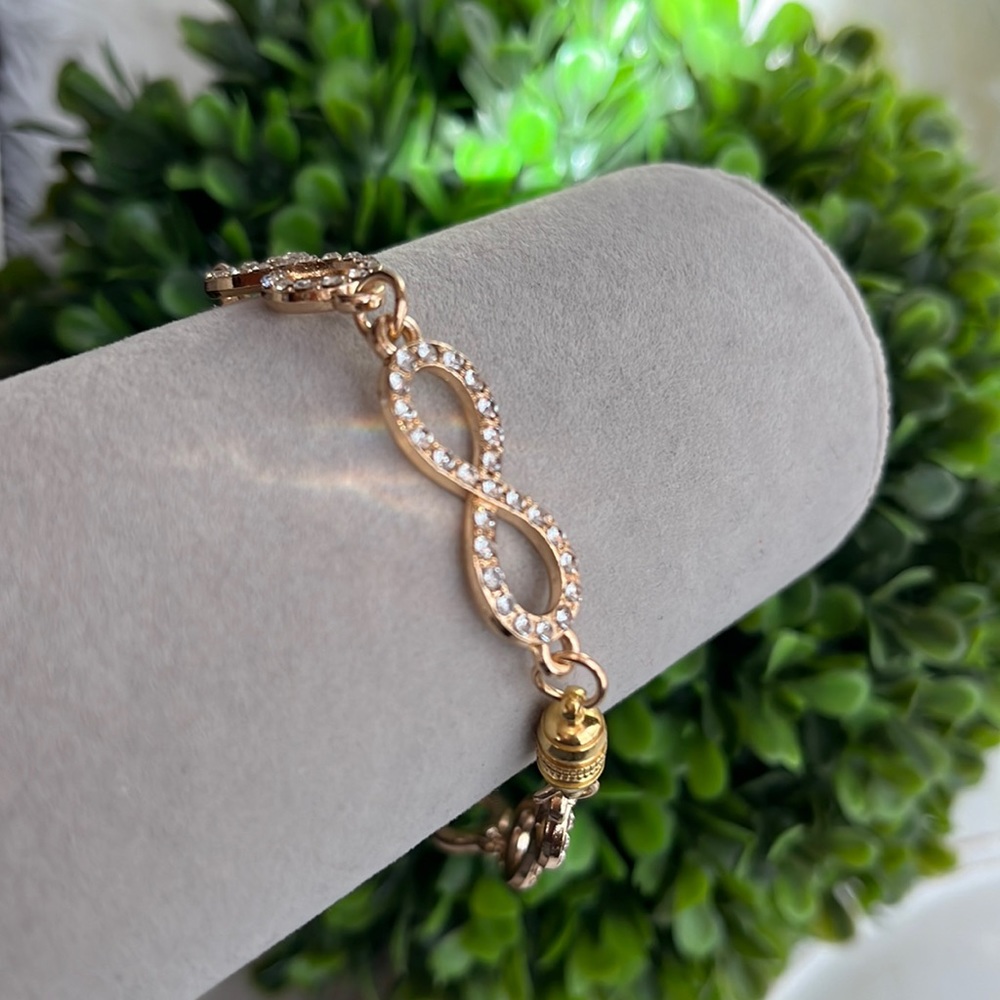 Custom designed fashion gold tone embellished infinity bracelet NWOT